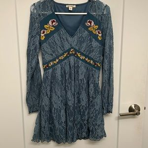 Mi Ami cobalt blue lace mini dress with maroon, blush, and yellow accents